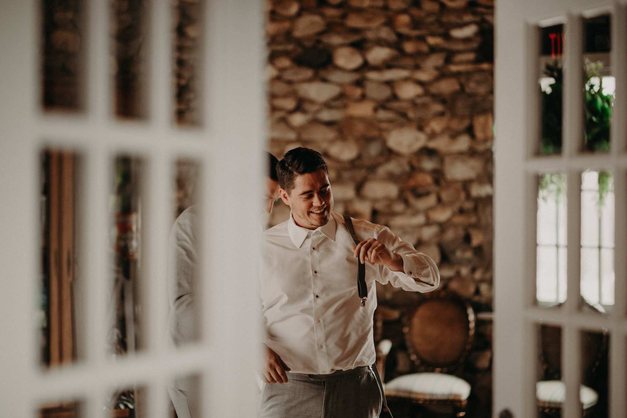 Groom getting ready in Castle Farms
