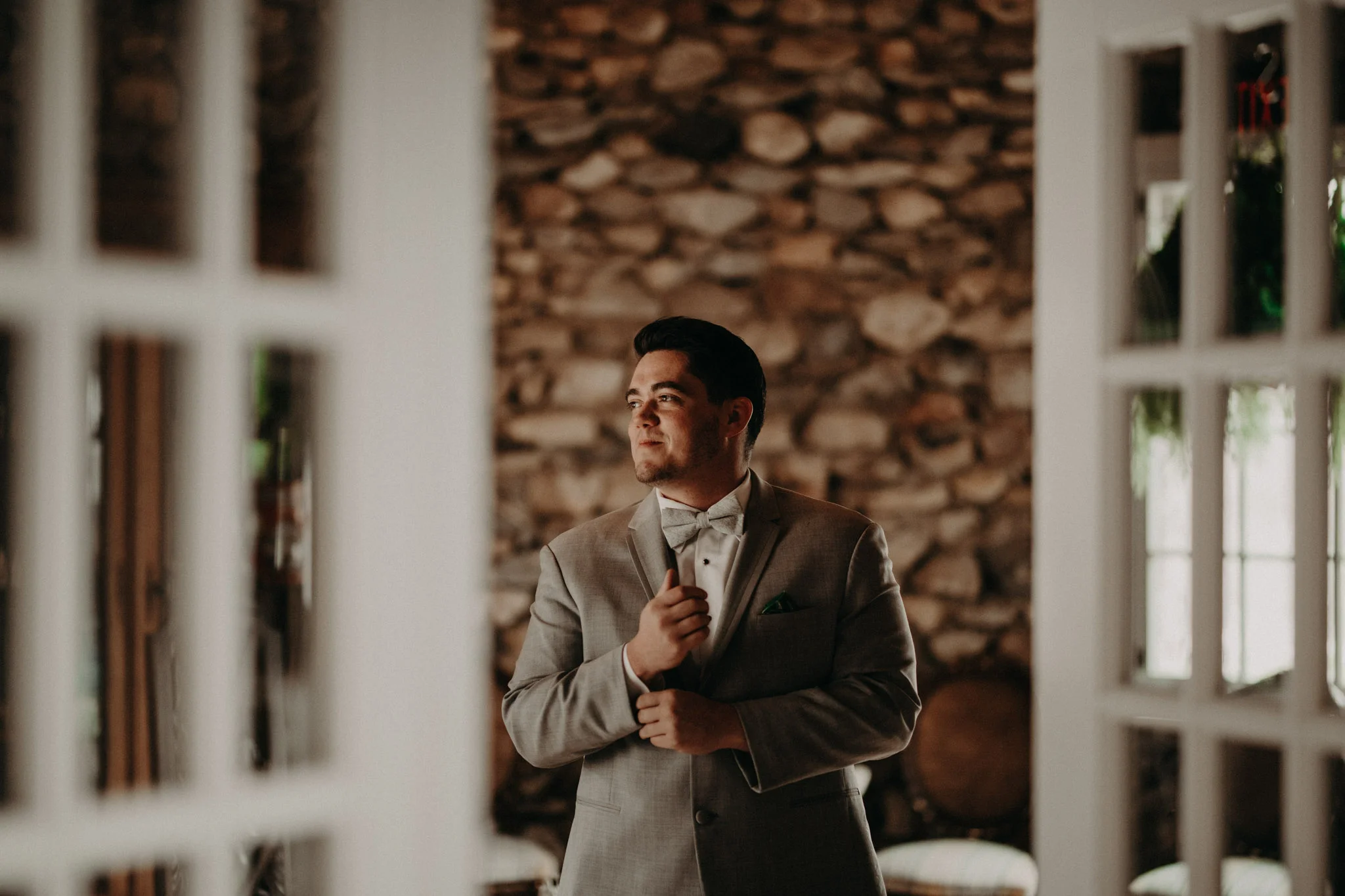 Groom getting ready in Castle Farms