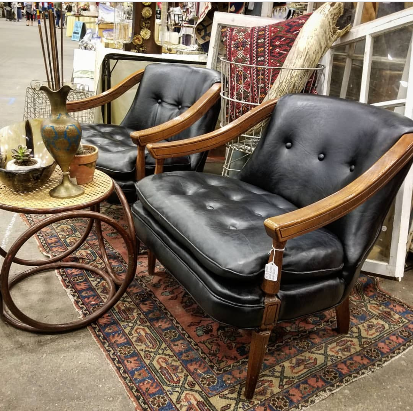 The black midcentury chairs came from the "Cloud Motel" in Lakewood, CA which was considered one of the touring motels during the Golden Age of motels back in the 60s.