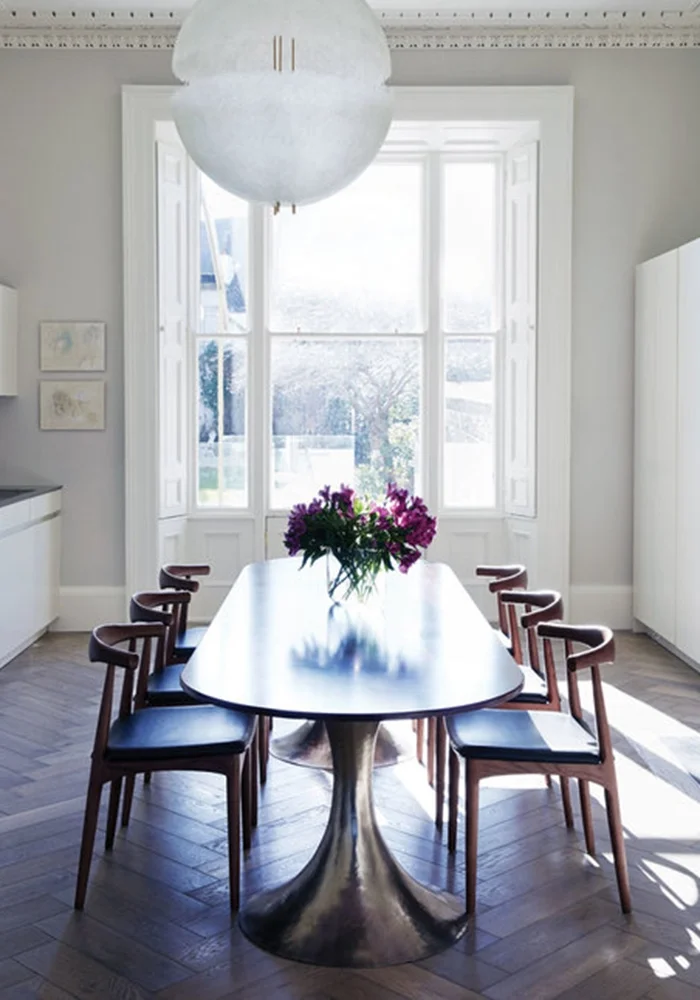 Studio 44 Leading Interior designer, Phillipa Buckley from Studio 44 design studio used walnut and leather Hans Wegner-style elbow chairs to complete a private client’s home.