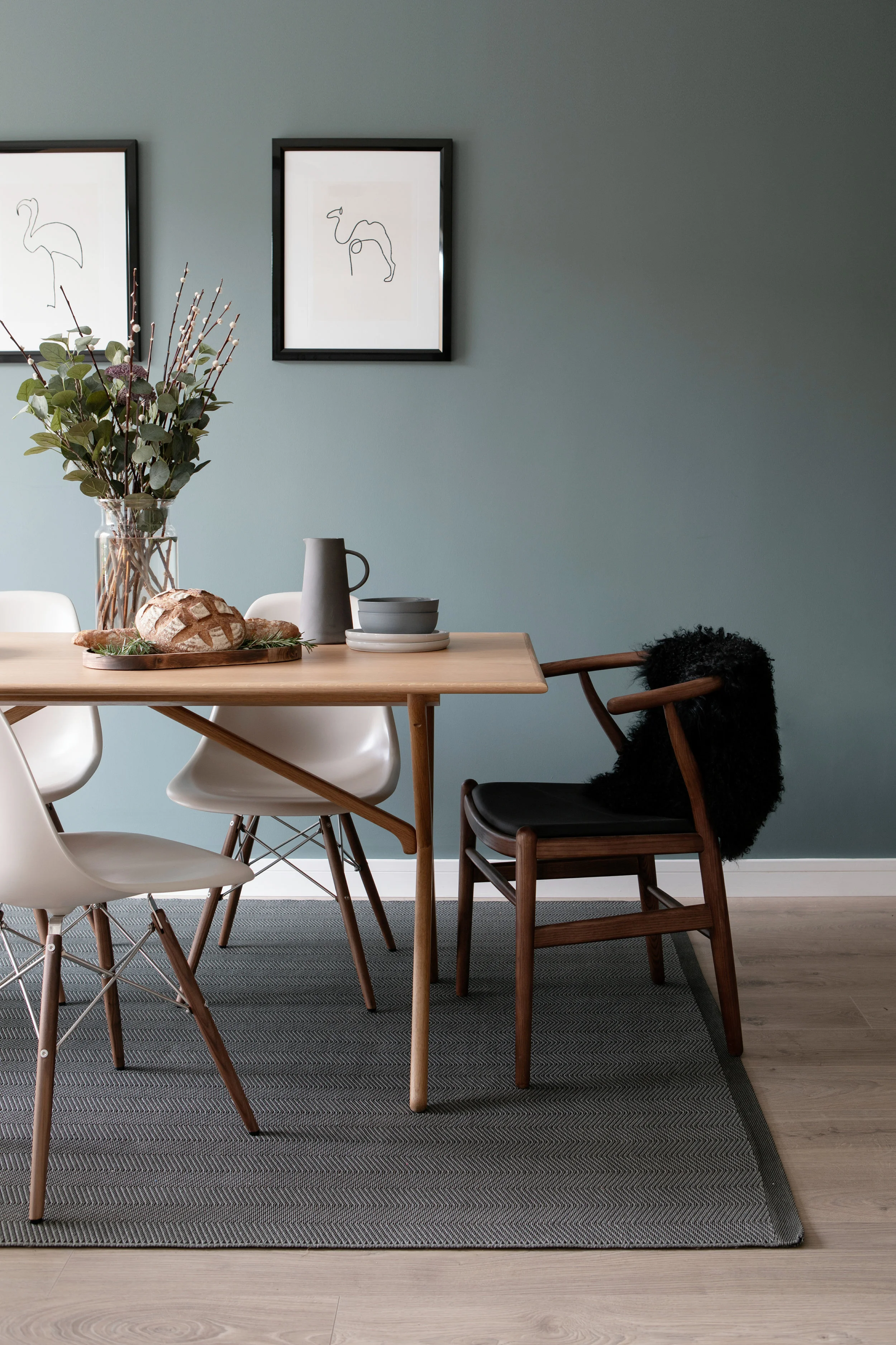 Love this mix of our DSW chairs and the wishbone chair used in our recent project with Cairn Homes PLC. So much versatility. Photo credit: Ruth Maria Photography