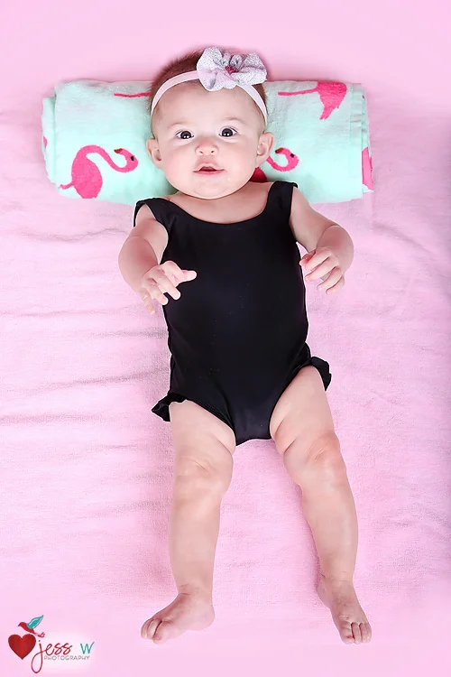 Solid Black Baby One Piece with Ruffle Trim