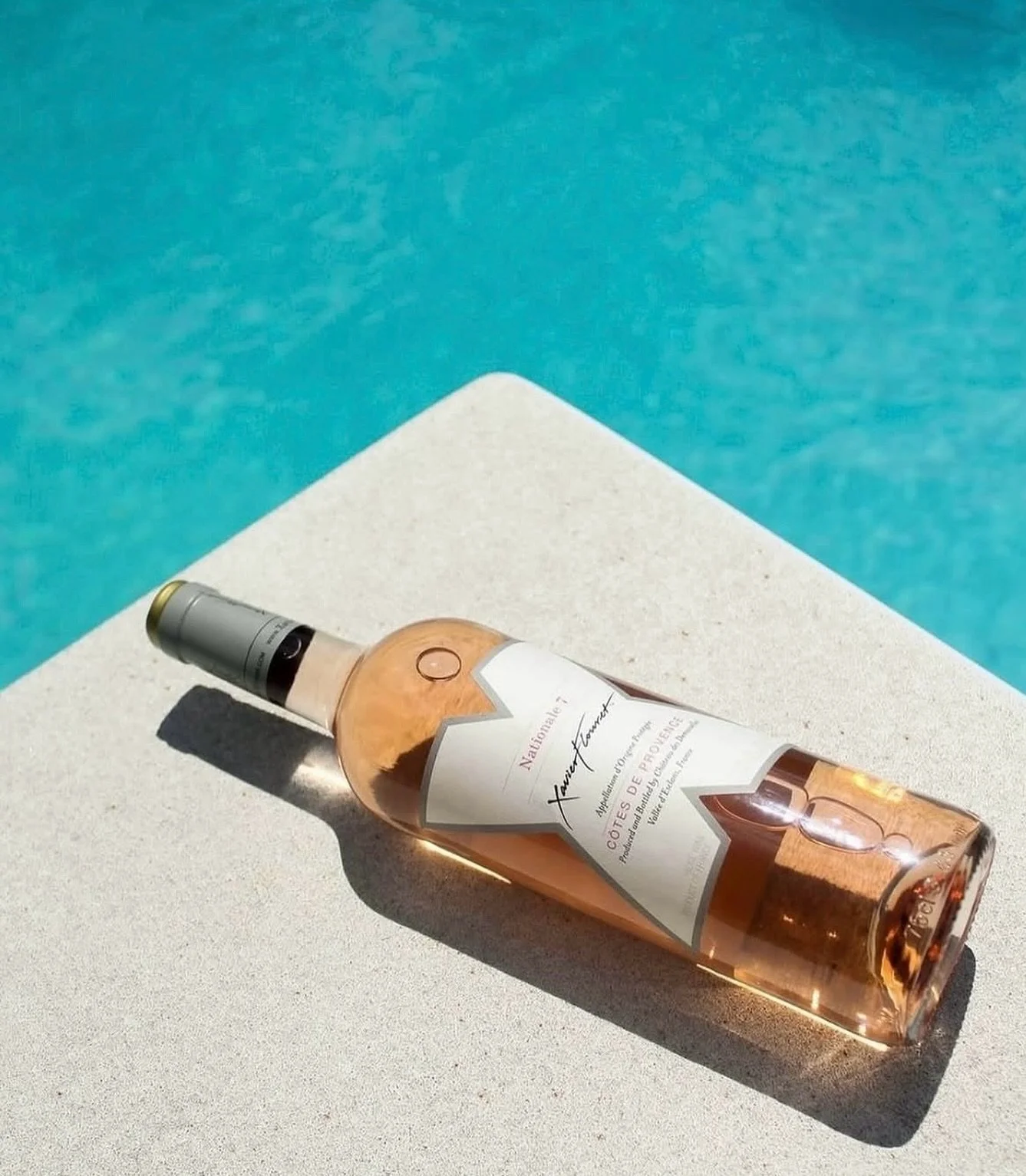 Officially time for summer sips ☀️ Celebrate Memorial Day with a glass of Nationale 7 Ros&eacute; poolside.