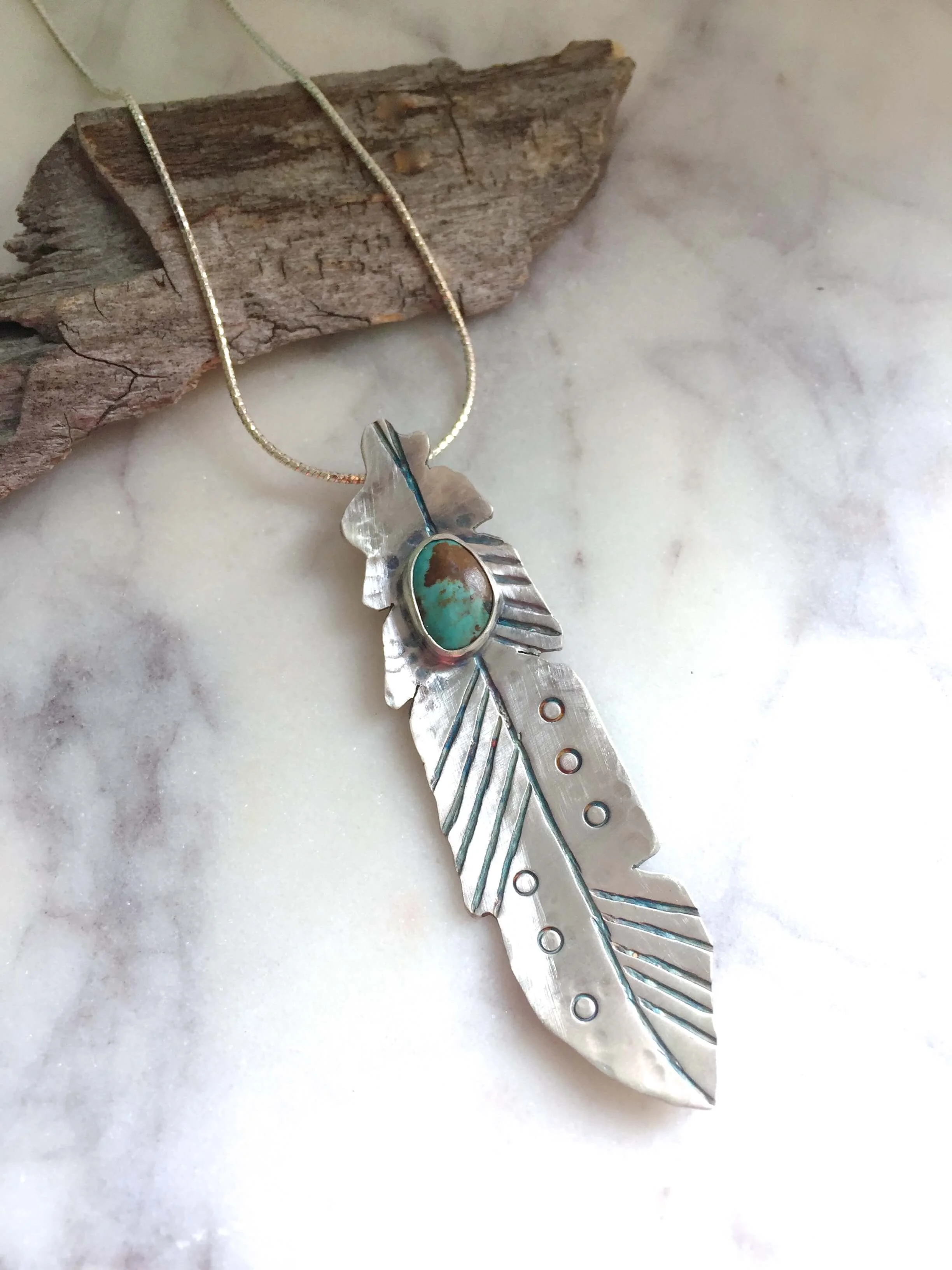 home page silver feather necklace.JPG