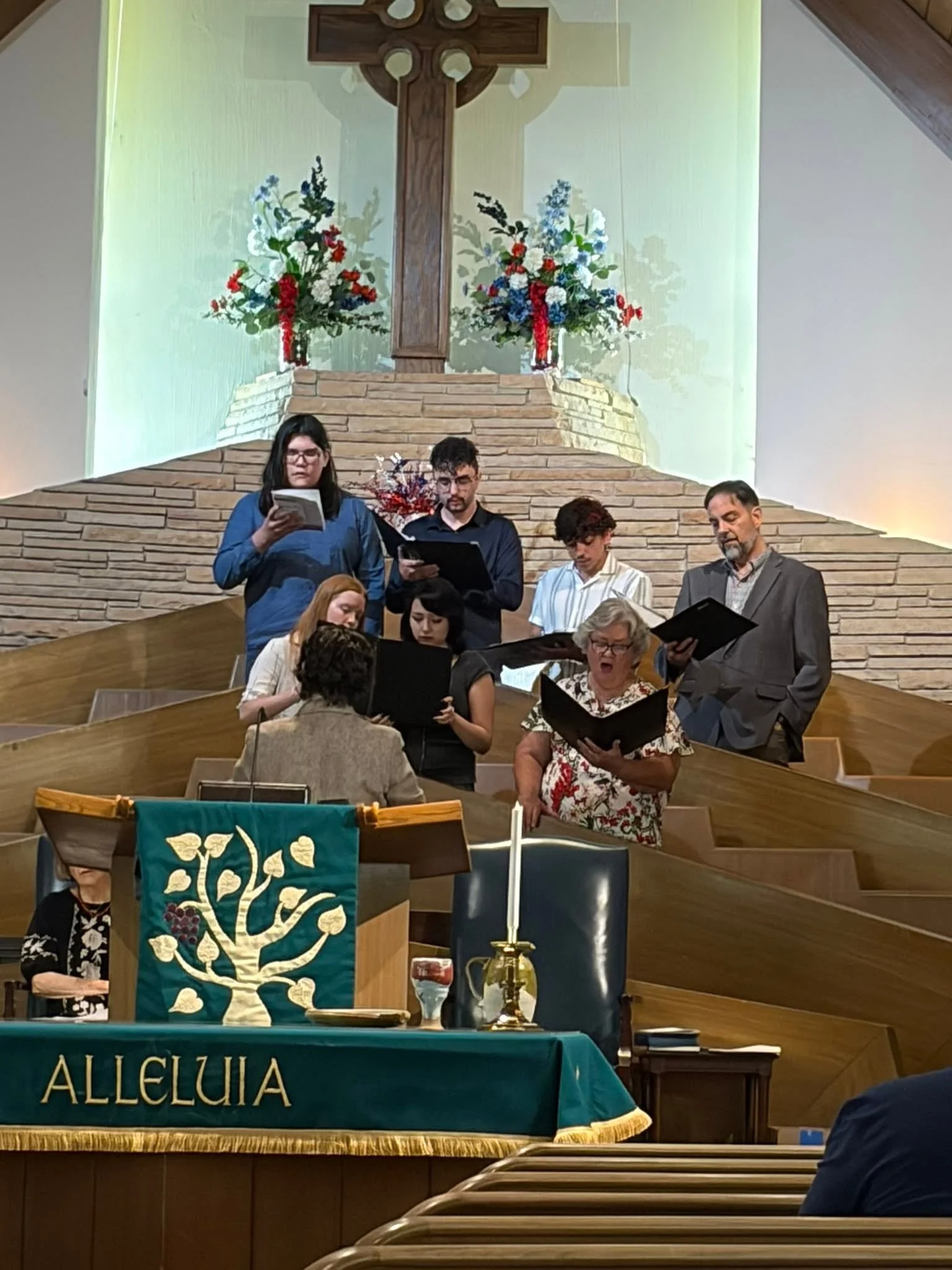 Our choir group praising him through song