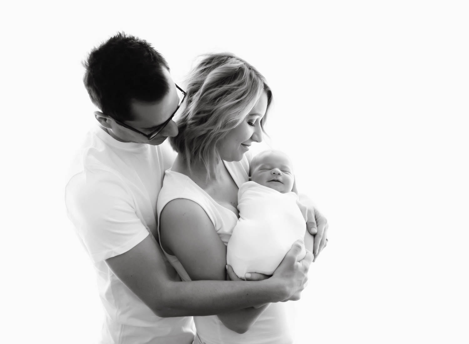 parents-with-smiling-baby.jpg