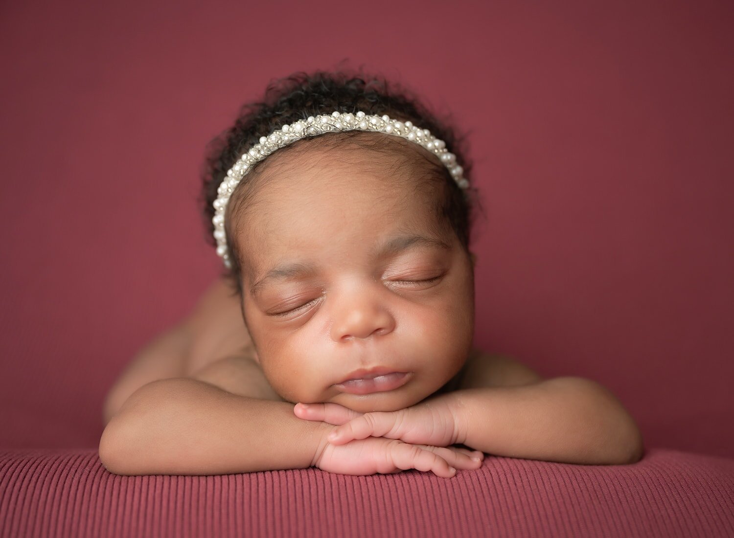 baby-on-plum-backdrop