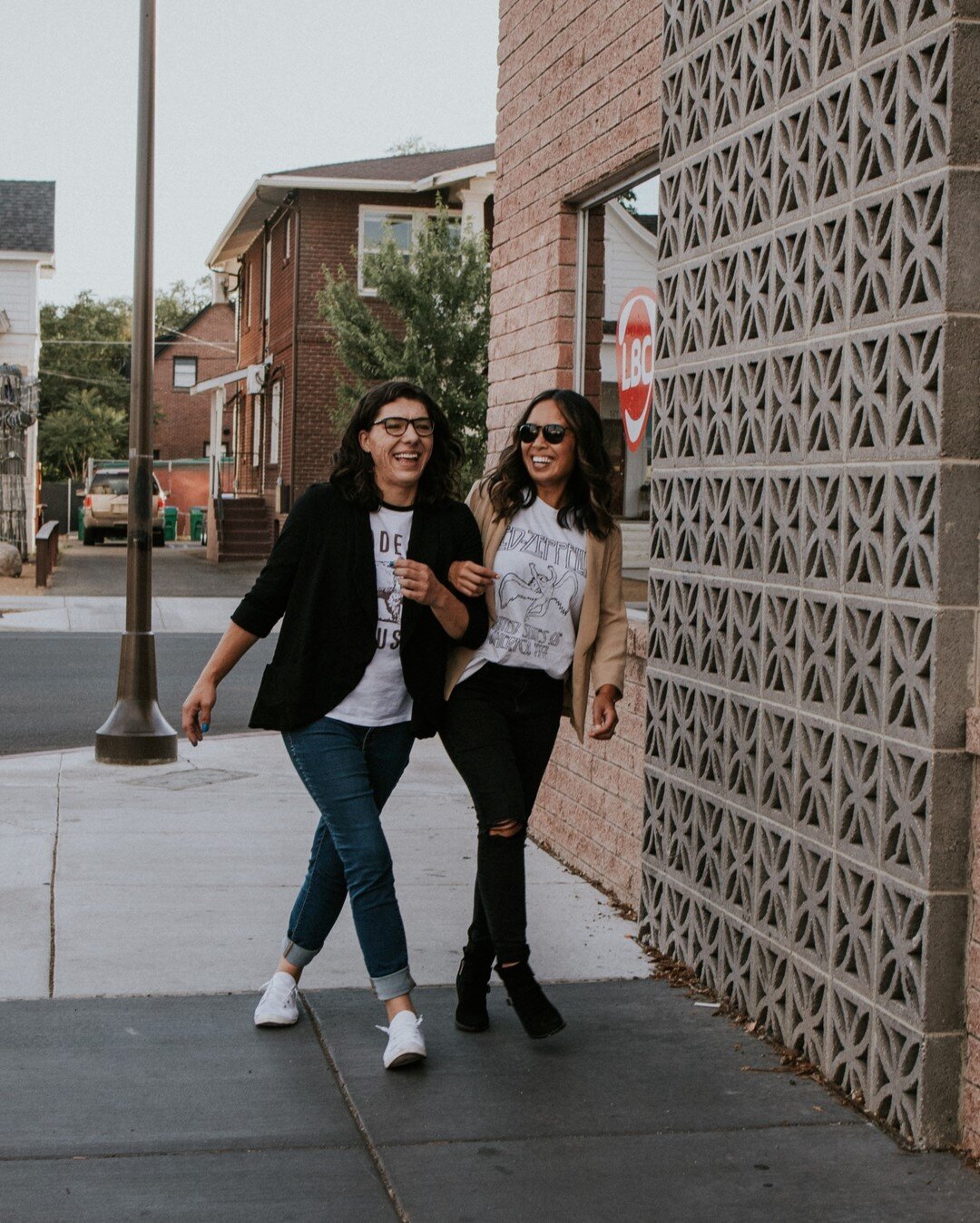 I love when my clients feel more like friends, and that is exactly how I felt with these ladies. They wanted an edgy photoshoot, so we started at my in-home studio in front of a custom book wall made from dictionary pages. (It&rsquo;s still up in my 