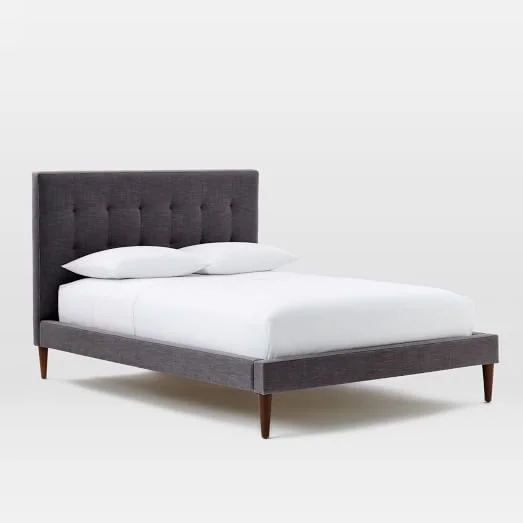    Grid-Tufted Upholstered Tapered Leg Bed in Linen Weave, Steel Gray     $999.00 sold by West Elm  