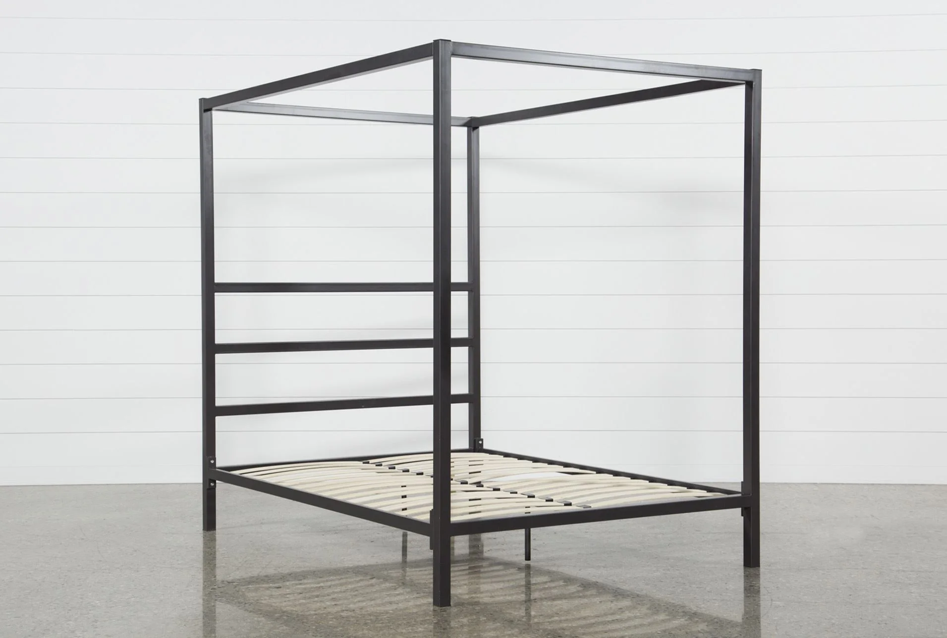    Orson Graphite Metal Canopy Bed     $495.00 sold by Living Spaces  
