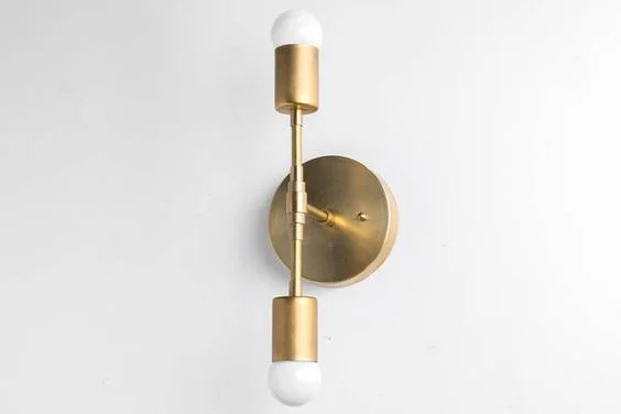    Brass Mid-Century Wall Sconce     $110.00 sold on Etsy  
