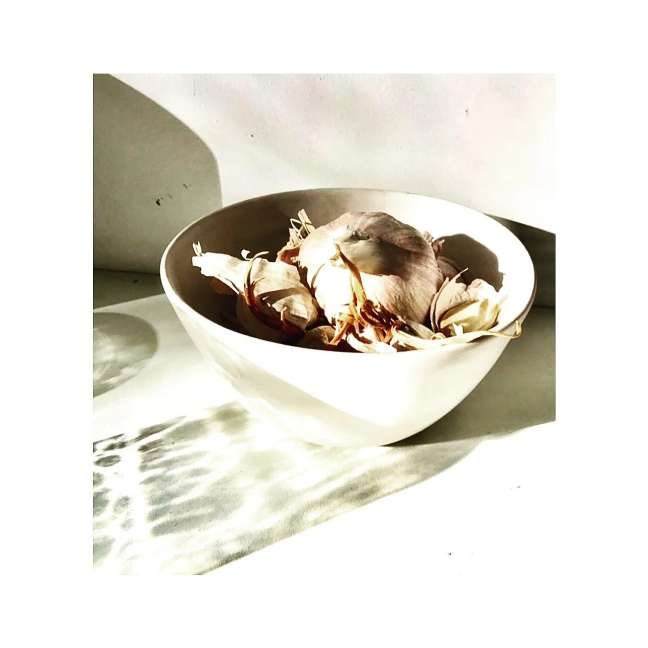 Garlic in a pot on my window sill #instafoodie #instafoods #instagarlic #garliclovers #fitfood #instacook #cook #kitchen #food #foodlover #healthyfood #healthy #healthyrecipes