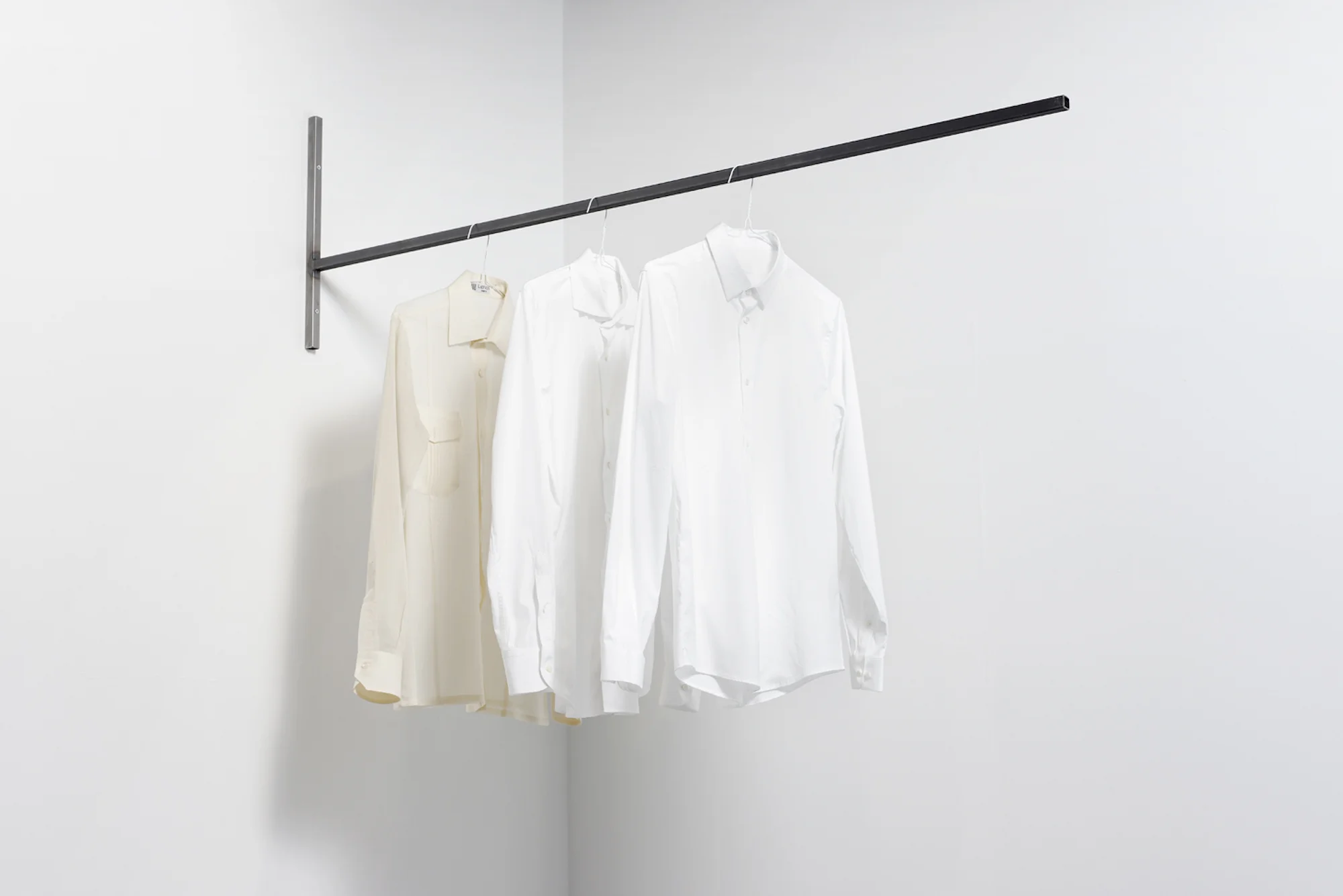Three abstractions on three histories 2016 Three white shirts, metallic structure, time Dimensions variable In 'Three abstractions on three histories' 3 shirts, apparently similar, hang high from the ground. They seem to belong to the same person, but in reality one belonged to the artist's grandfather, the second to his father and the third to the artist. Each refers to a time, and contains a part of the Lebanese history.