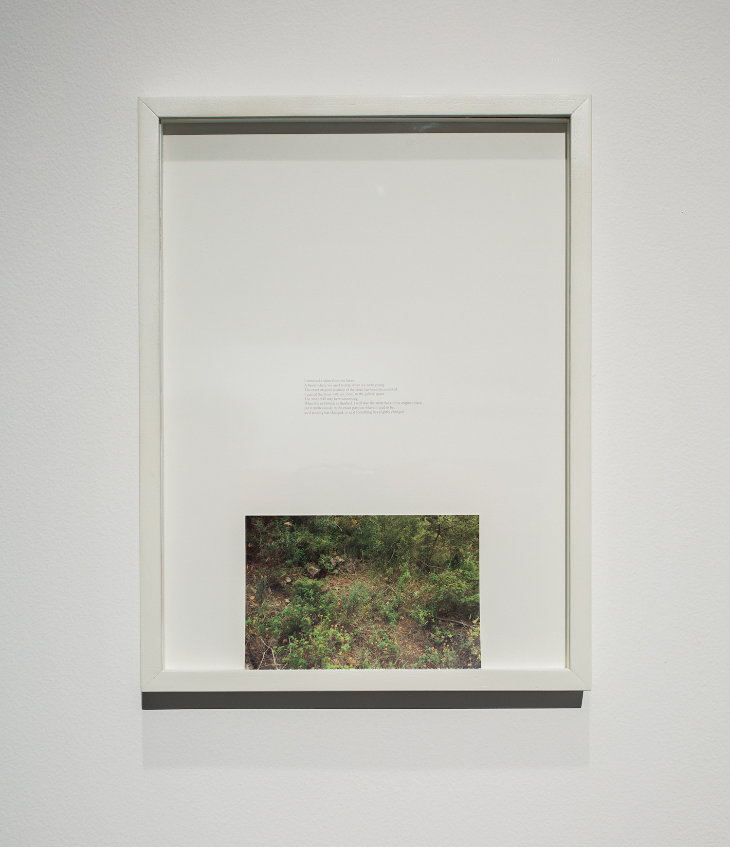  Charbel-joseph H. Boutros  A removed stone 2013 Plaster replica of stone removed from Naas forest in Lebanon, inkjet on newspaper, wooden shelf, c-print 