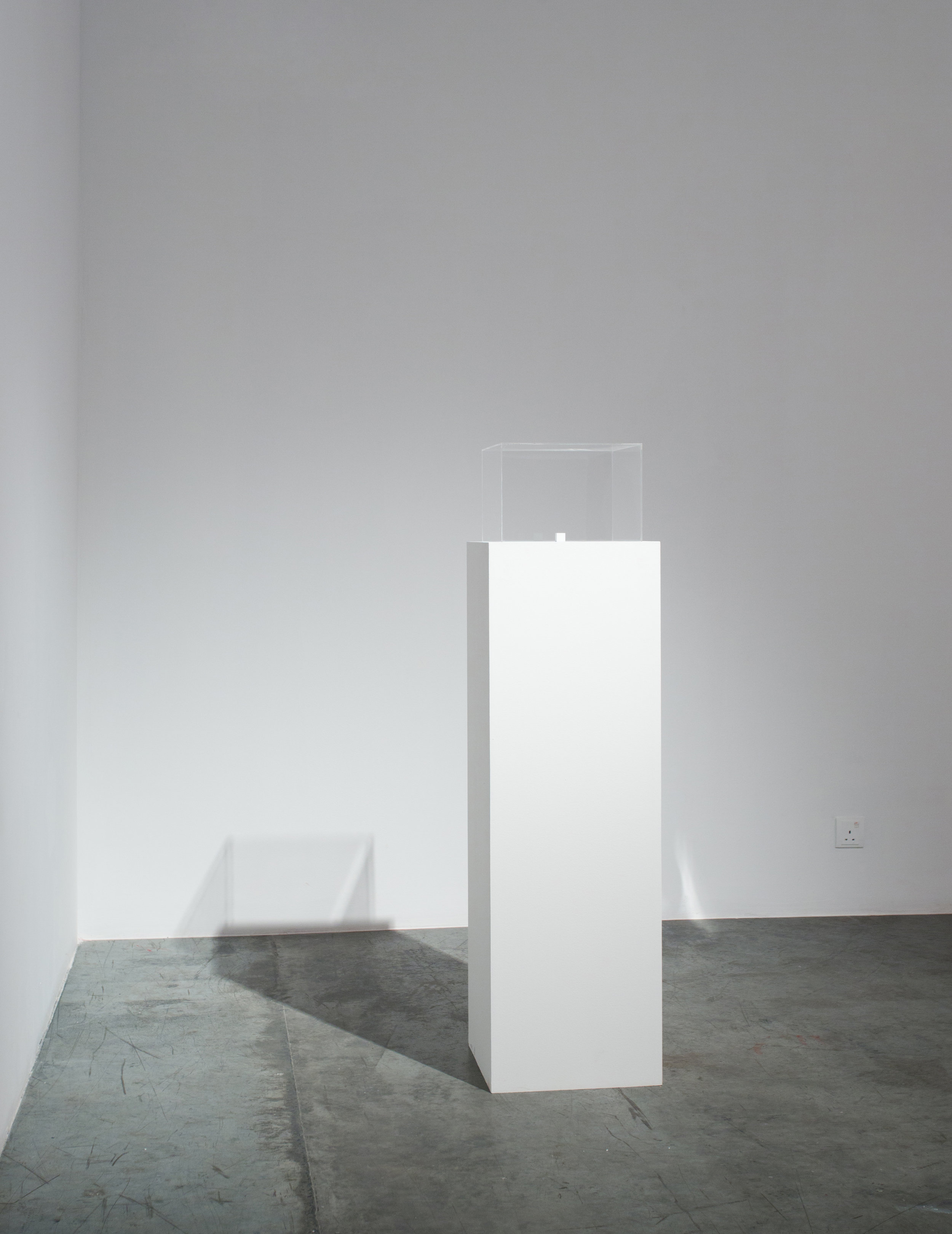  Charbel-joseph H. Boutros  1 cm3 of infinite darkness 2013 Steel polished mirrors, darkness, wood, white paint 1.8 x 1.8 x 1.8 cm Edition 1/3 