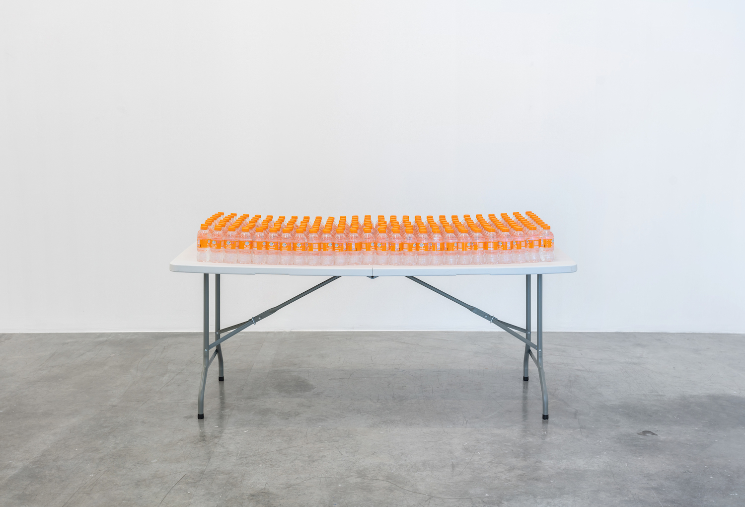  SUNSHINE 2018 Water bottles, table Al Ain Vitamin D water bottles on a plastic folding table Dimensions variable 