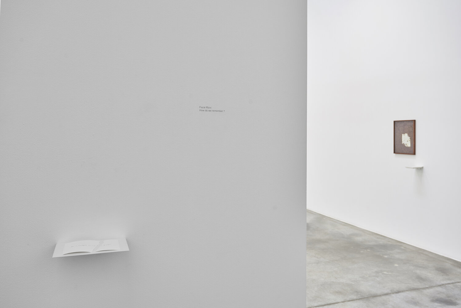 L-R She is beautiful on a piece of paper, 2019, handwritten text on paper, metal shelf, dimensions variable / The Visit, 2019, archival print on canson infinity paper, offsetprint, metal shelf, 45.72 x 35.5 cm (frame) / 16.5 x 11.7 cm (metal shelf), Edition 1/4
