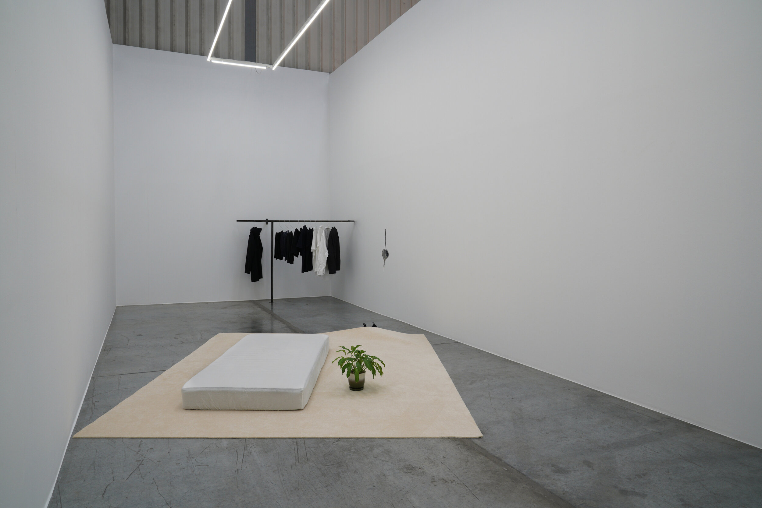  Untitled until now  2021 Mattress, carpet, dreams, plant, night Cartography #3, votive candles wax, wishes,  airplane sleeping mask Dimensions variable 