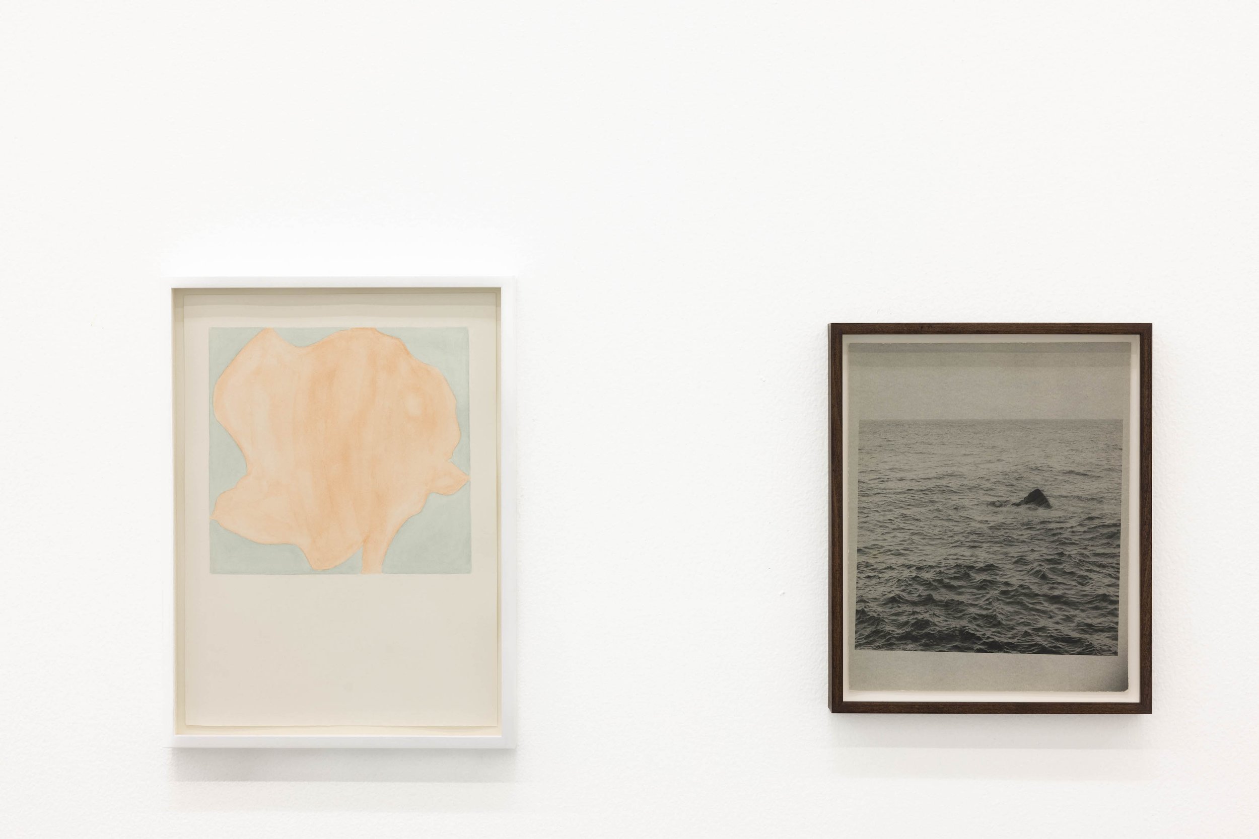 L – R  Depths of green, 2021, watercolour on paper, 26 x 36 cm / 39 x 29 cm (framed) / Faux raccord II, 2014, black and white analogue photograph on baryté paper, 29 x 23 cm / 32 x 26 cm (framed) 