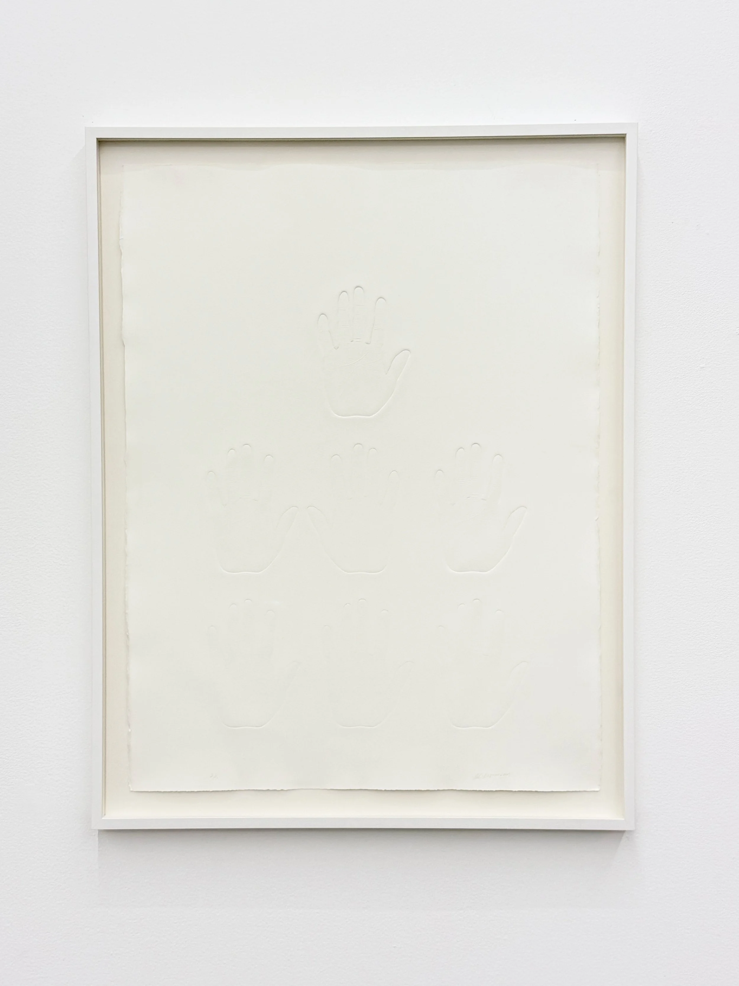  Ali Kazim, Untitled, 2005, embossed print impression of hands on paper, 76 x 57 cm, edition 2/5  Image courtesy of the artist, Amrita Jhaveri LTD and Grey Noise   