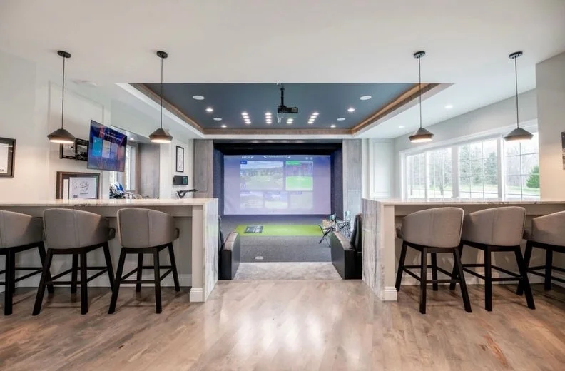 Completed in Solon ✨

This custom addition brings elevated entertaining to life, featuring a new dining room, golf simulator, and wet bar, all seamlessly integrated into the existing home. We loved bringing our client&rsquo;s unique vision to life th