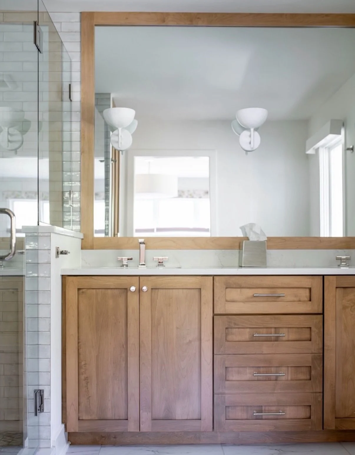 Check out this stunning bathroom from our Gates Mills custom renovation project 😍 With warm natural materials, texture and high-end finishes, this primary bath is a spa oasis. 

#renovation #renovations #customrenovation #customrenovations #remodel