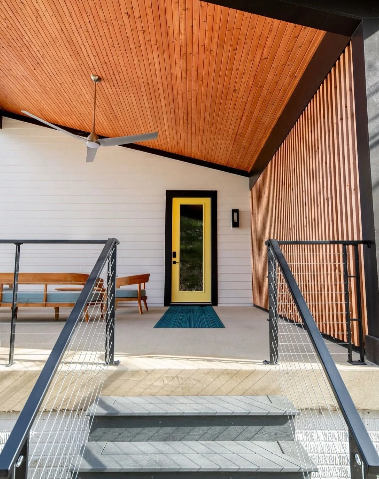 The perfect porch to enjoy this warm weather on ✨We love the natural materials and texture the wood slats bring into this space 😍

Are you thinking of building a custom home? Visit mancusohomes.com 

#newconstruction #newhomebuild #newhome #customho