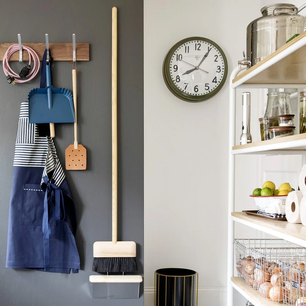 wood and metal broom that can be displayed in a mudroom and serve the purpose of functional art? Yes please.