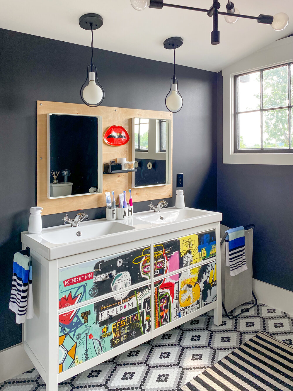 family bathroom with modern art accents