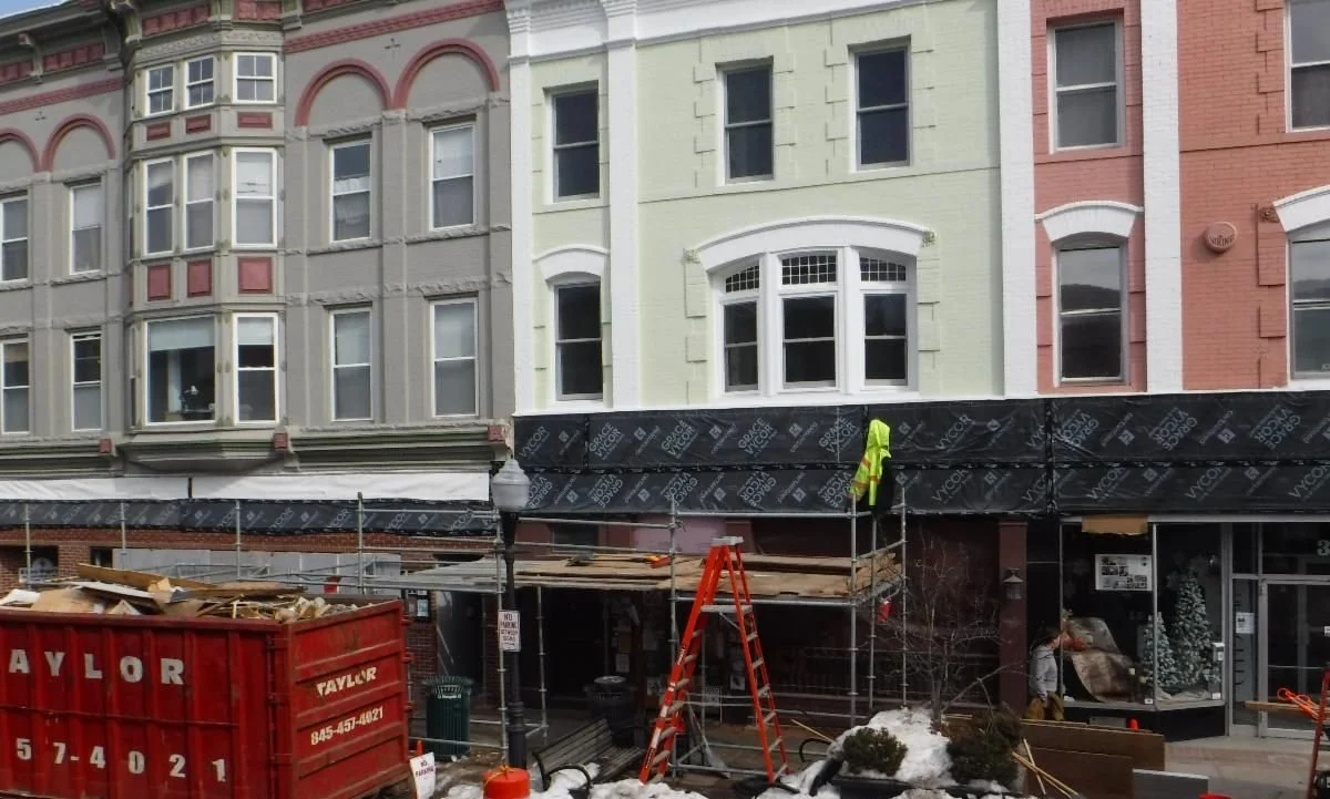 Pike Plan canopies removed, paid parking resumes