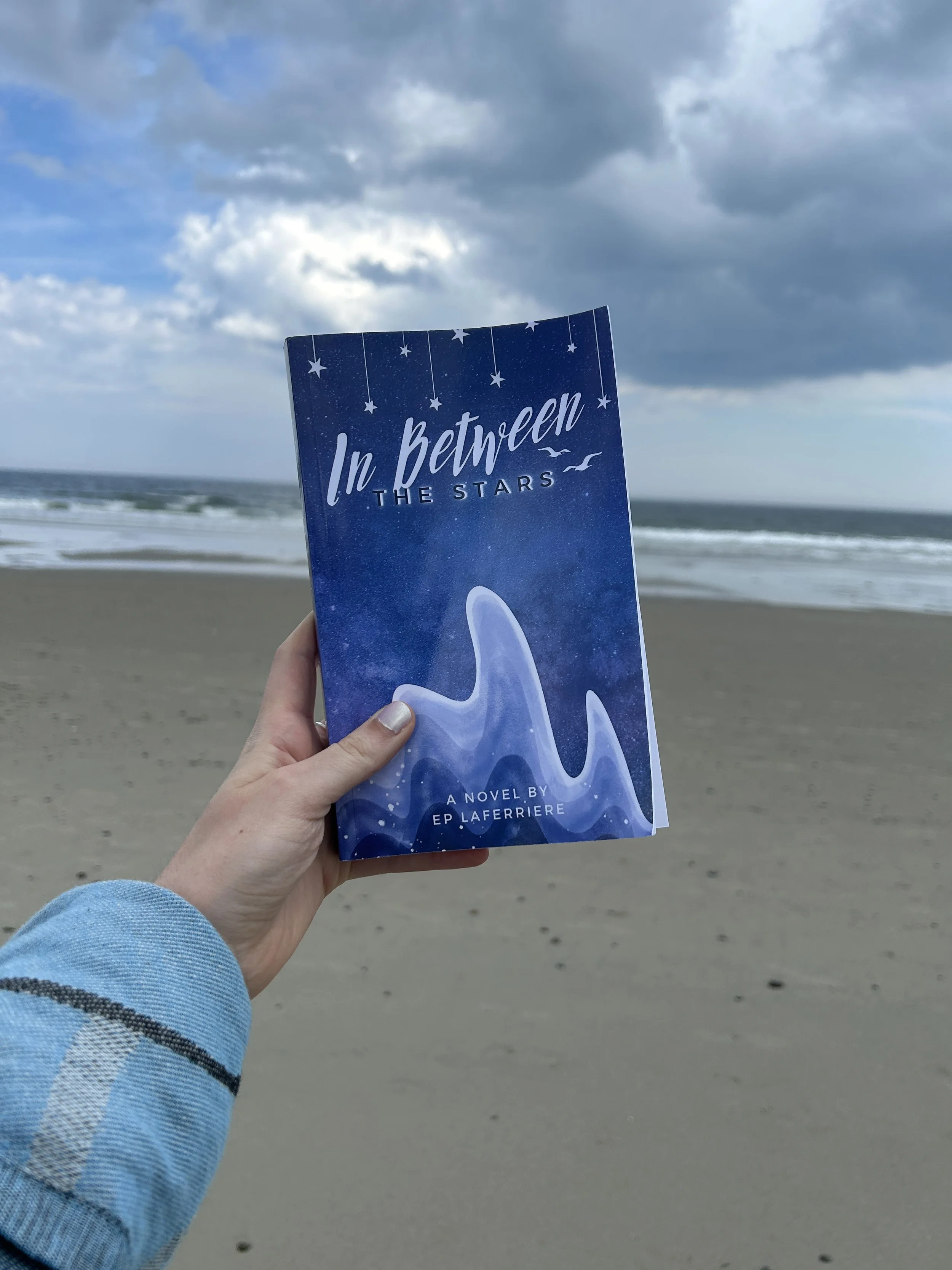 “In Between the Stars” by Evelyn Laferriere
