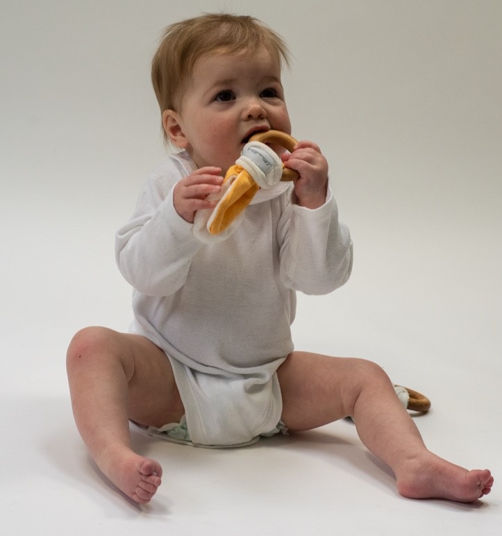 Willa and yellow teethers.jpg