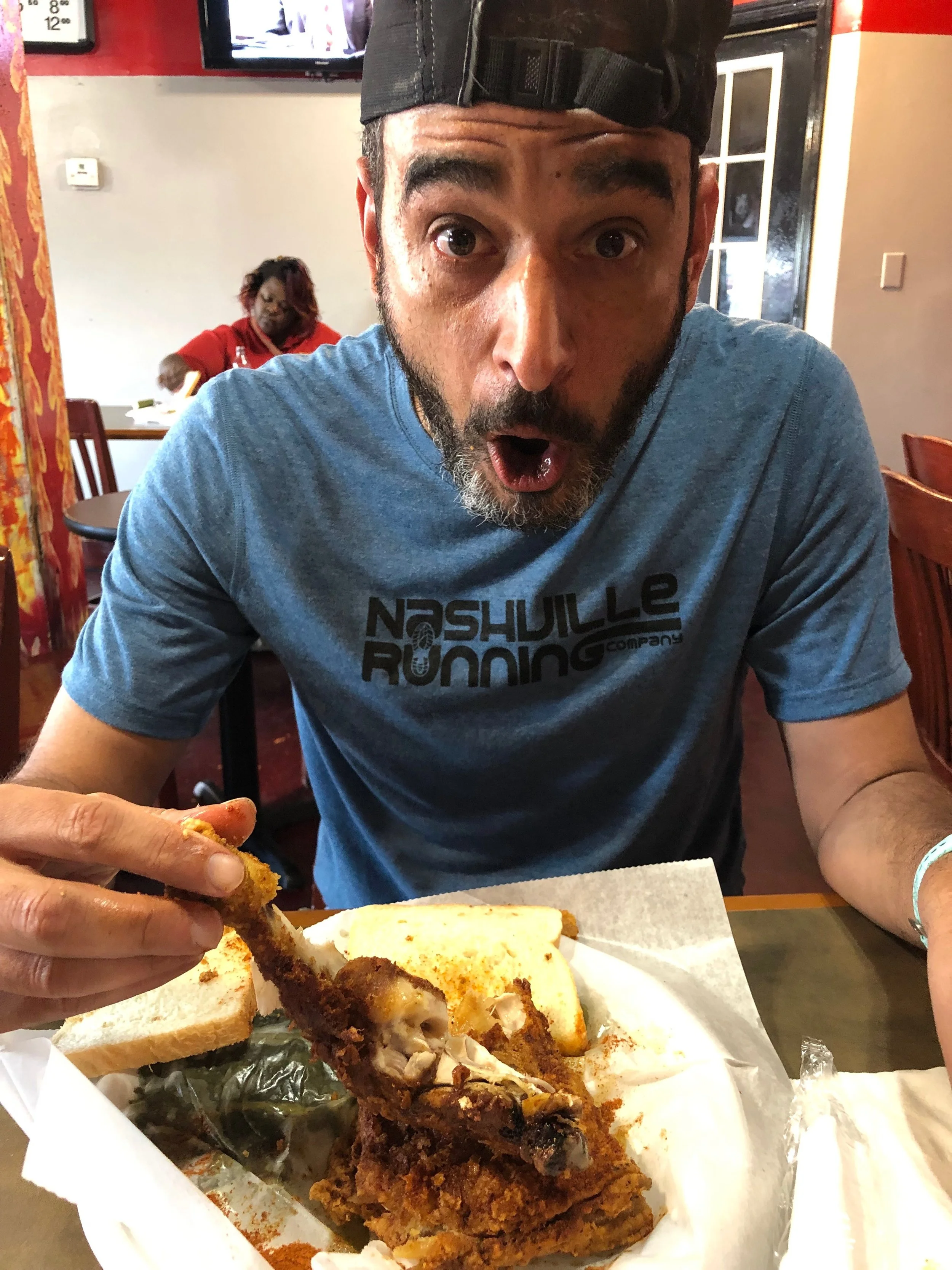 Sweat is literally dripping from his face! Hot Chicken at Bolton’s.