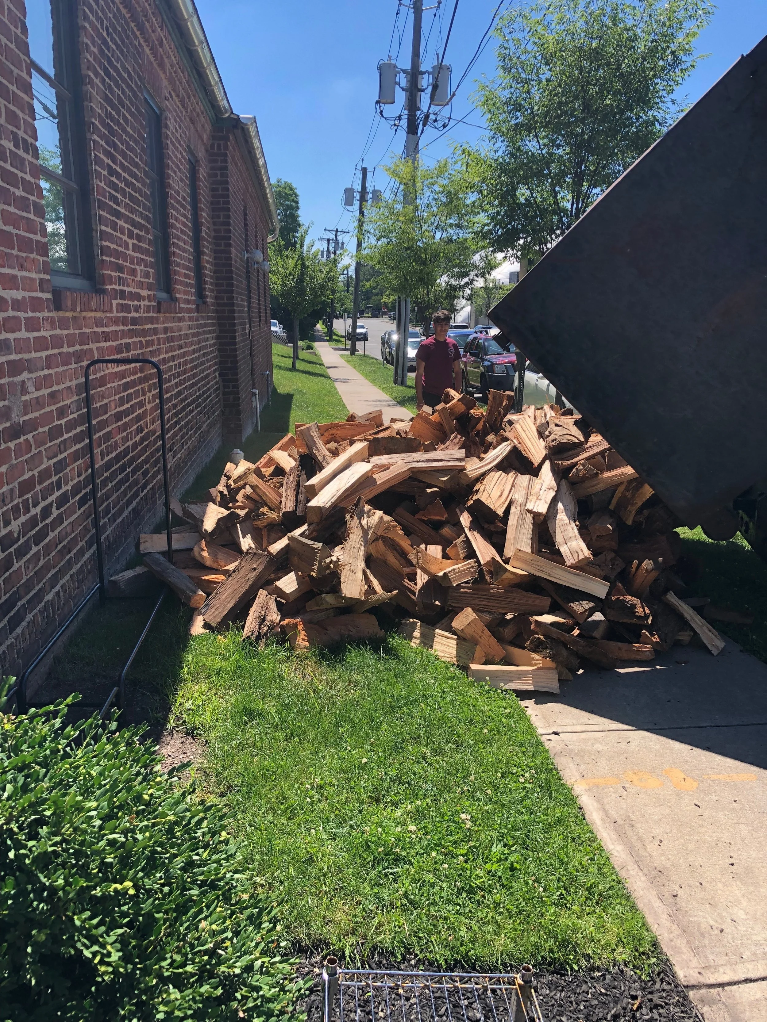 Had to call in the backups (Anne) to help get everything ready for Josie’s birthday party because Jess, Brad &amp; I were dealing with a bit of a log jam. Does stacking wood count as cross training???