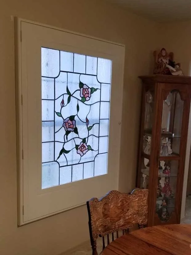 Here, we created a custom frame for a piece of stained glass.