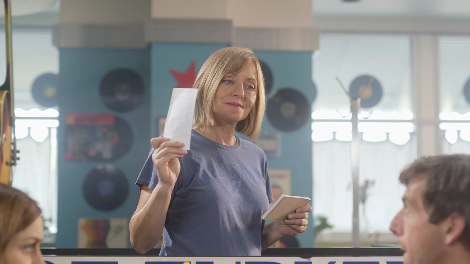 Lana Pierce plays the role of Waitress