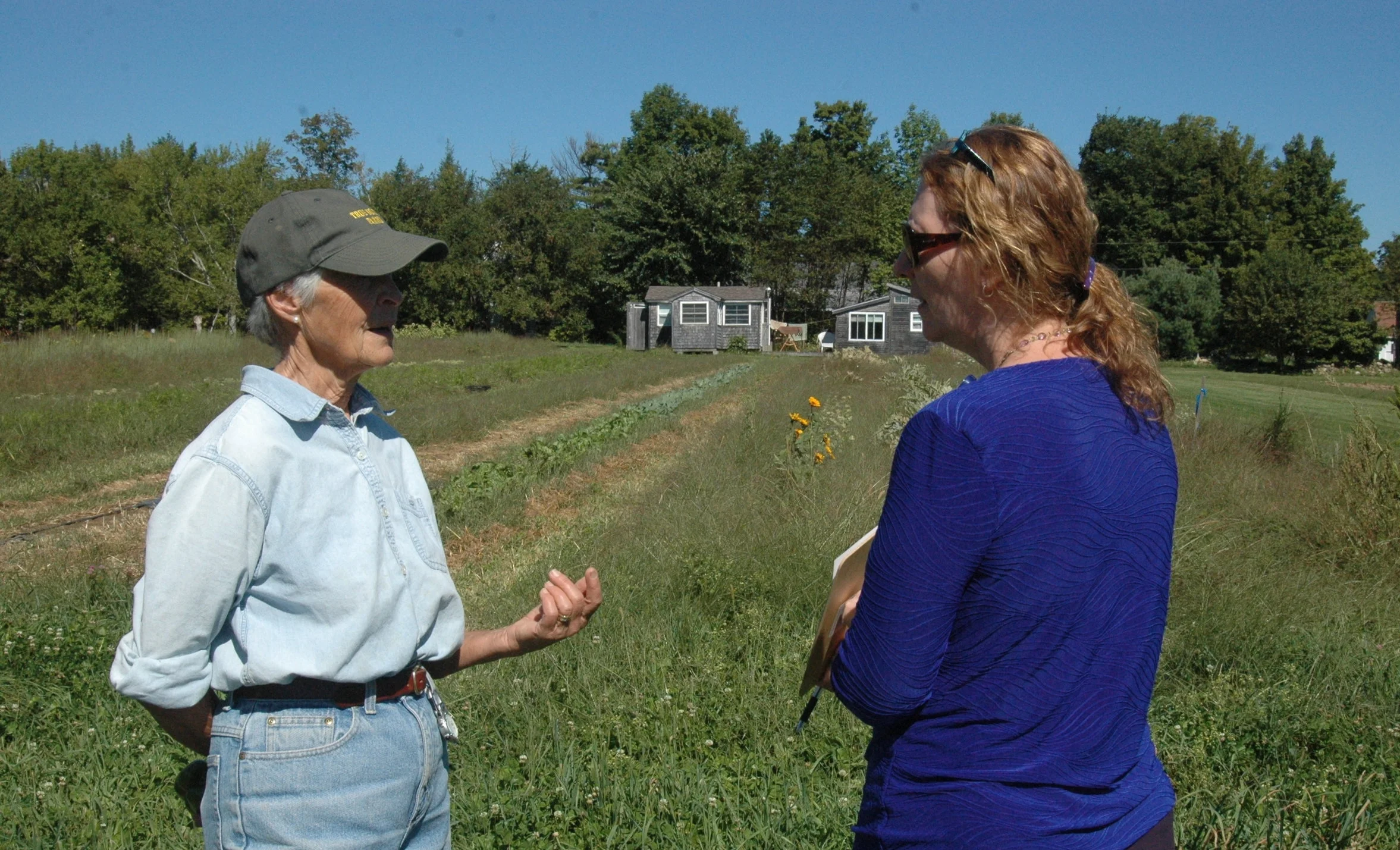 Sheila Costello (Right), Nutrition Director at Waldo County General Hospital, meets with Farmer Sarah Lincoln-Harrison at True North Farms in Montville, ME.