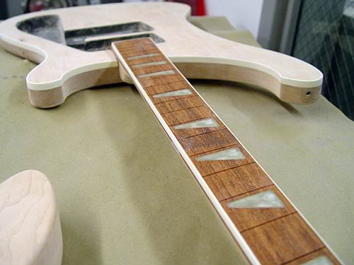 GUITAR BEING TEST-ASSEMBLED BEFORE PAINTING