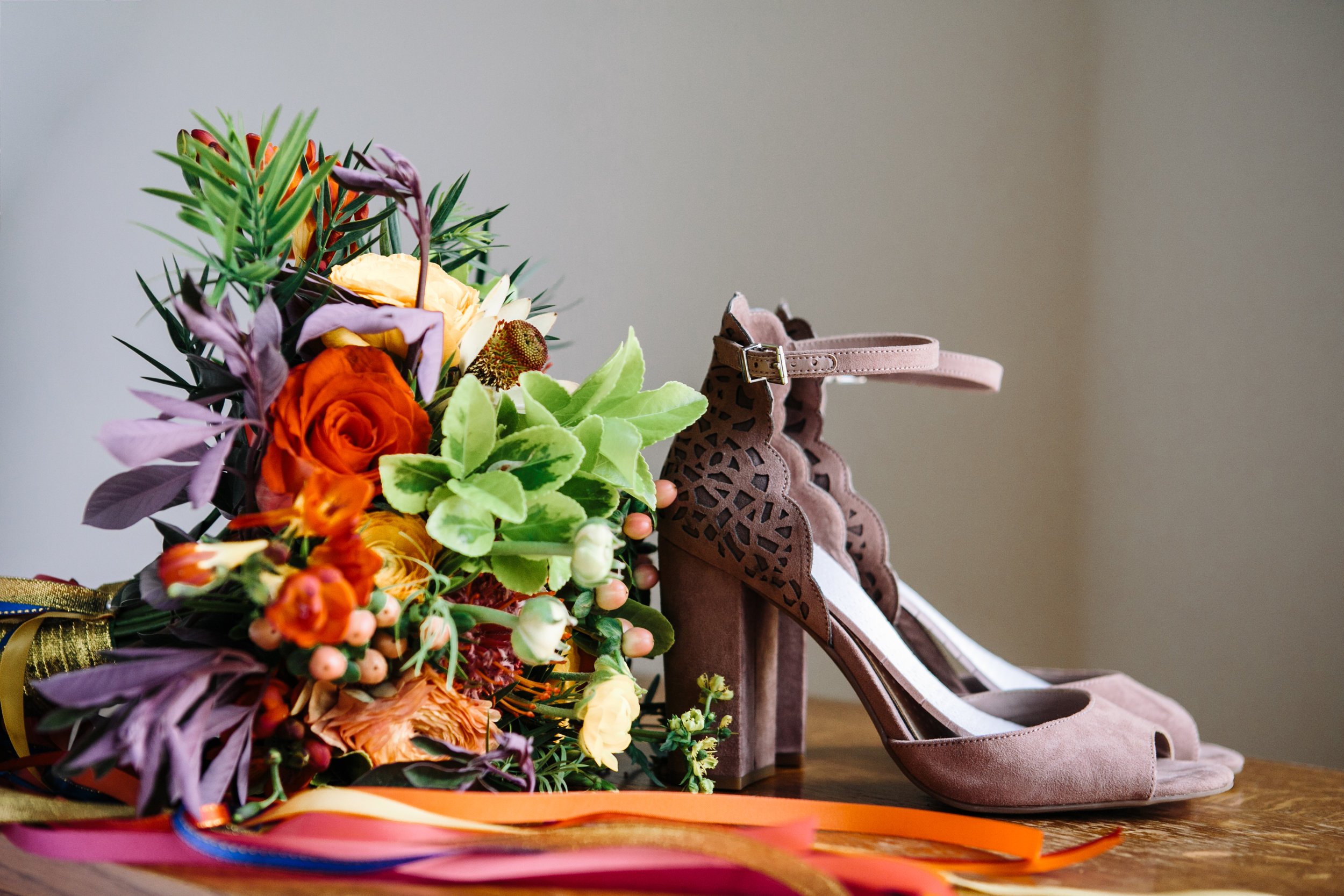 Jewel toned bridal bouquet and shoes