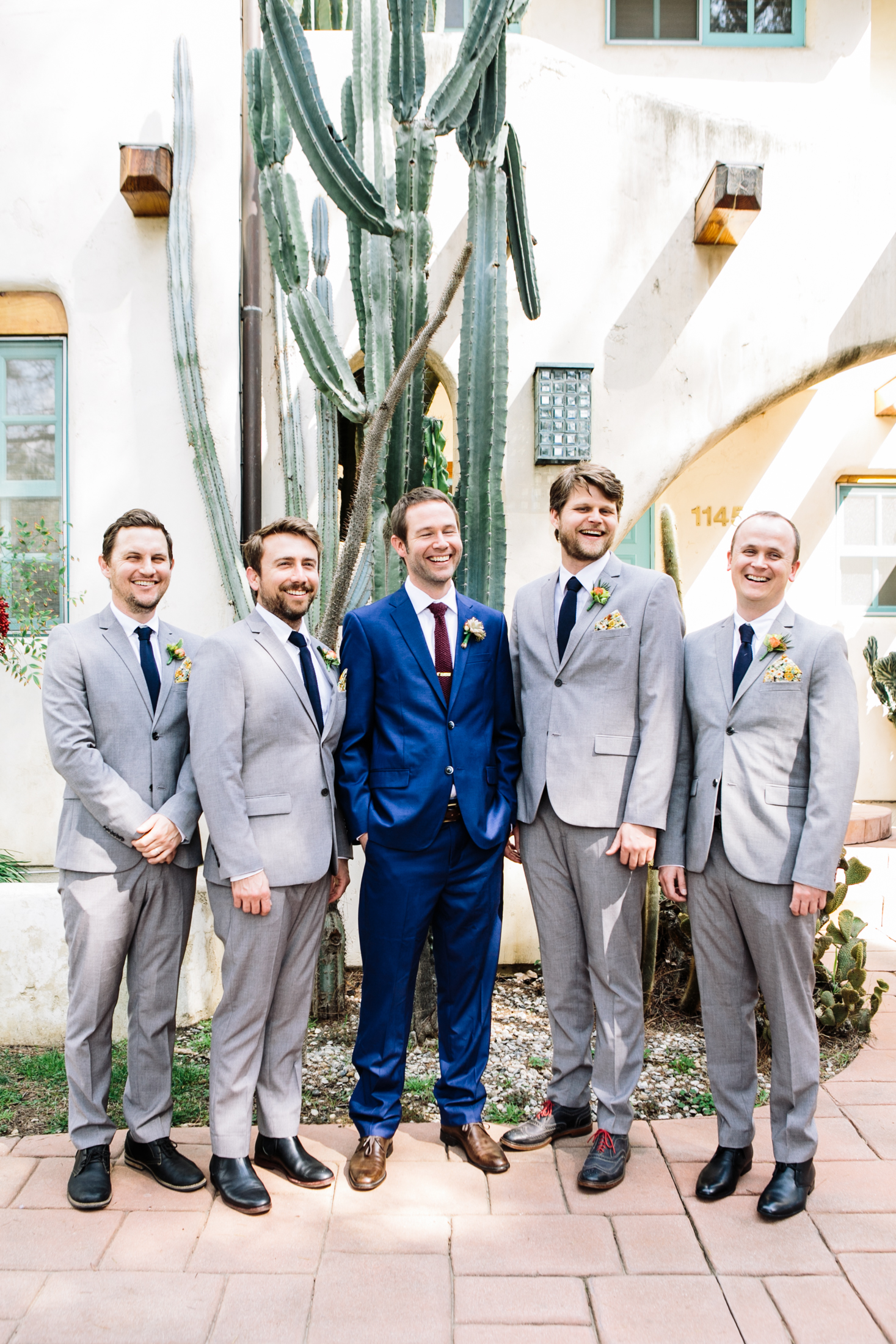 groomsmen and groom