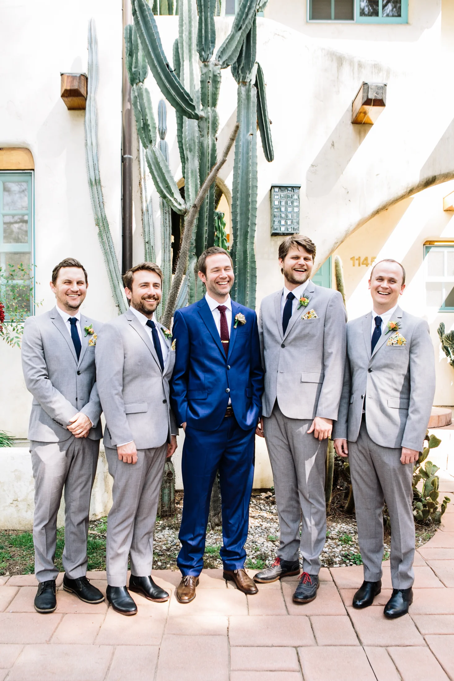 groomsmen and groom