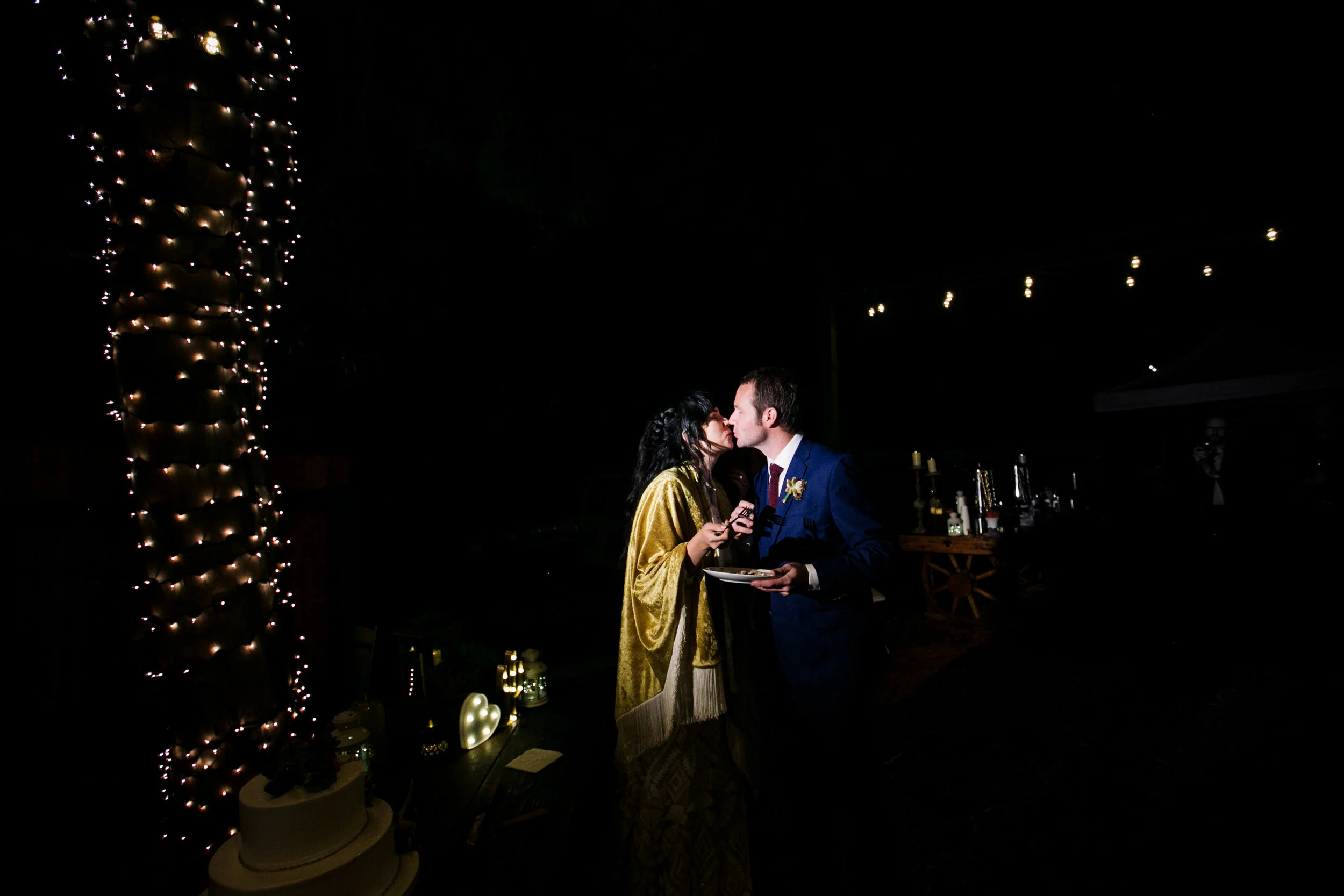 Bride and groom cut the wedding cake