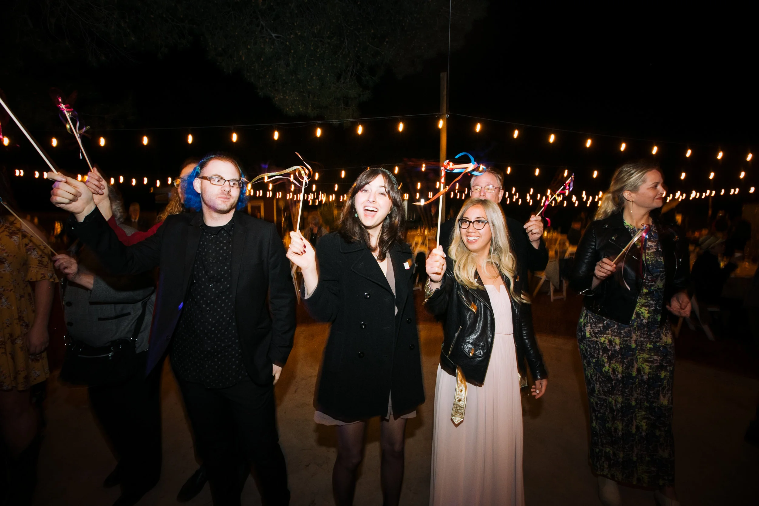 Grand Exit with ribbon wands