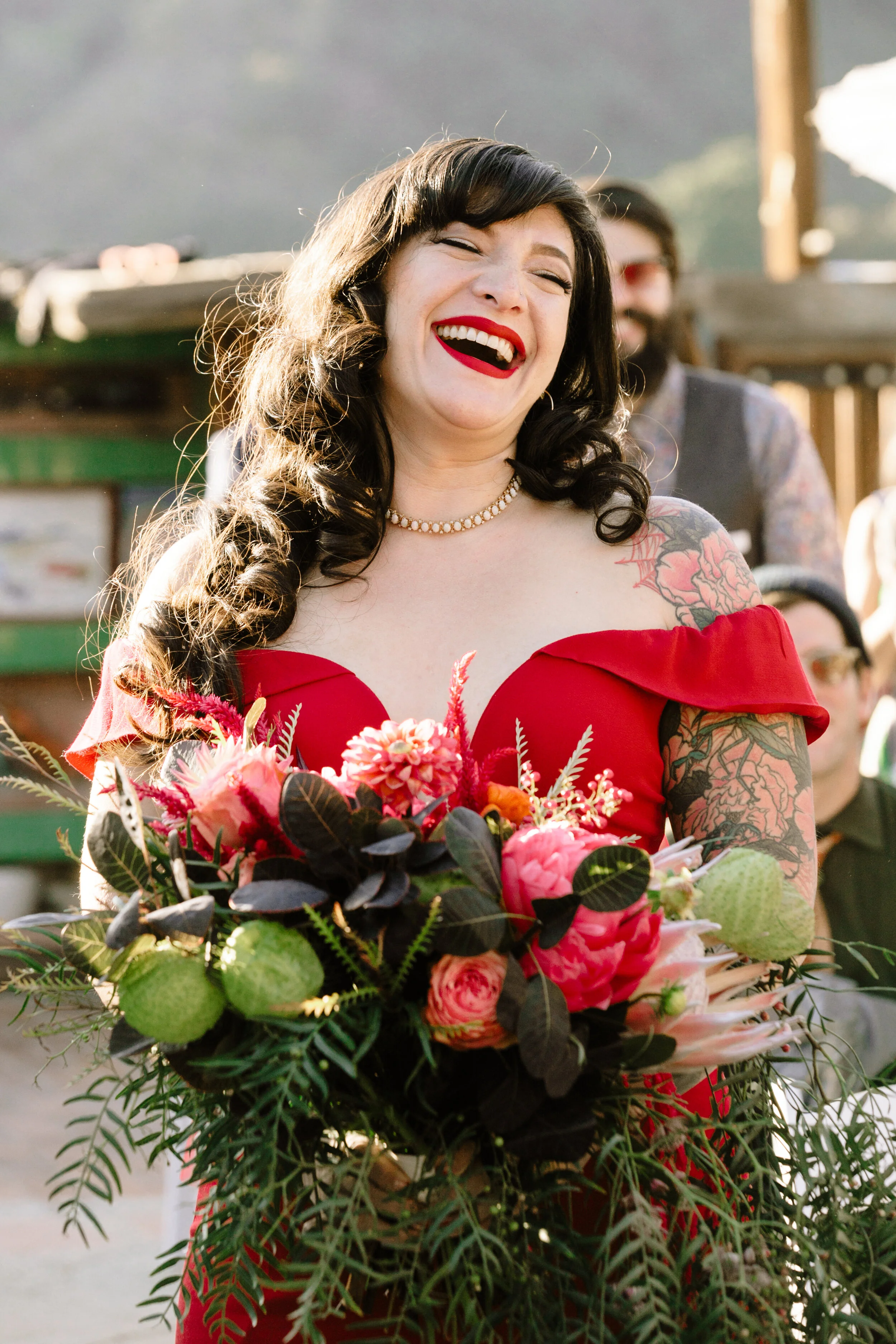 Bride jovially walks down the aisle