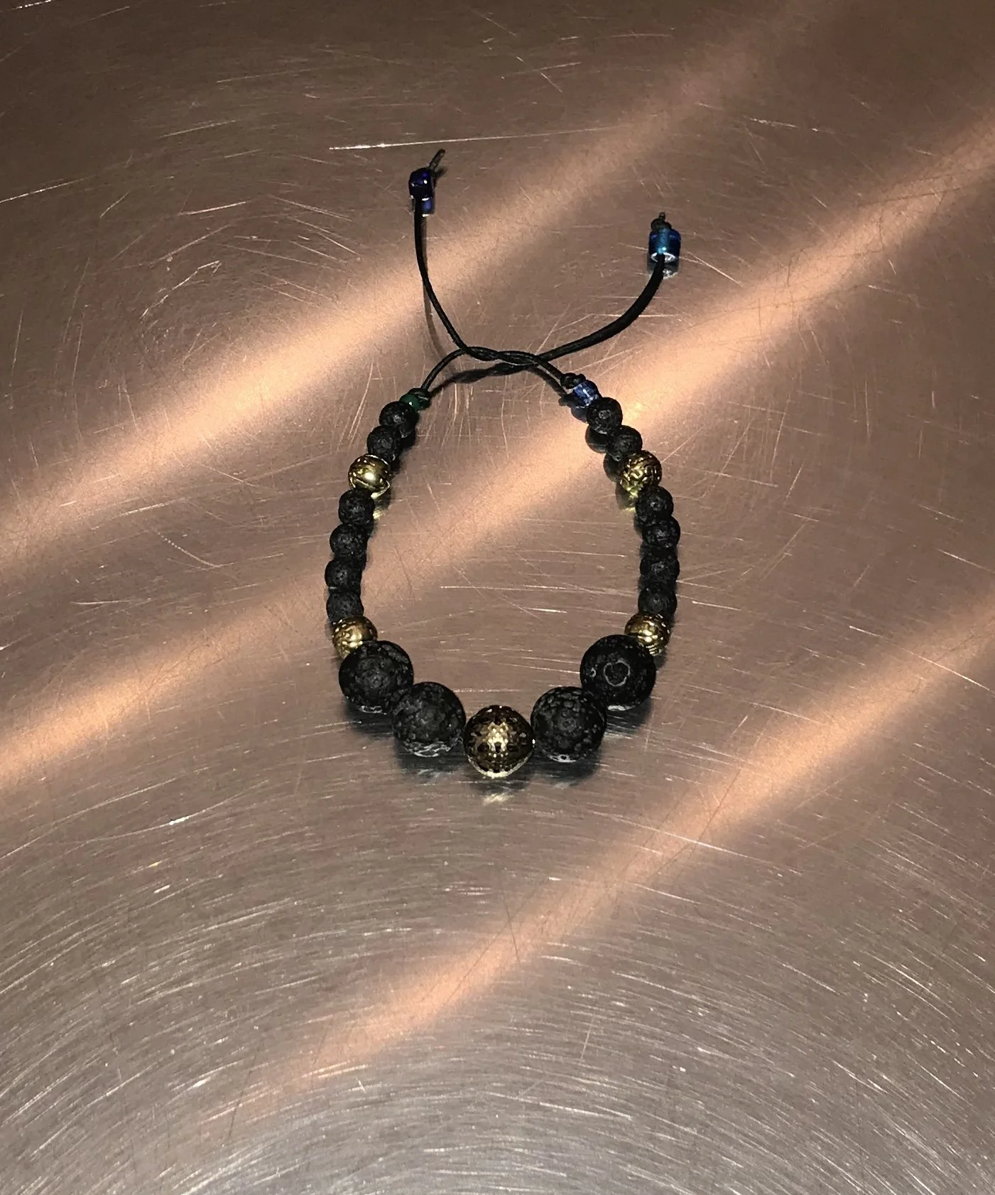 Black/Gold Lava on a String