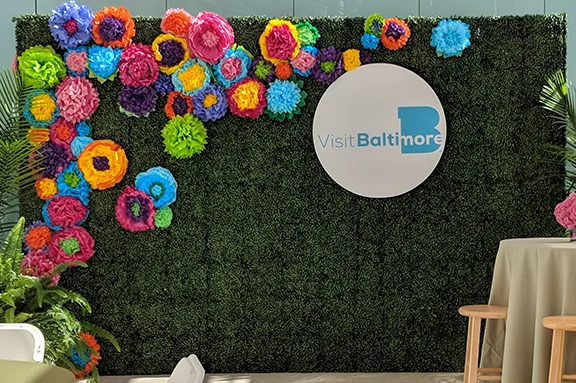 Photo backdrops are a great way to publicize your brand. Guests pose infront of the custom backdrop, post their photo on social media, and your brand hits the internet. Be sure to communicate your event hashtag and upload a snapchat filter.