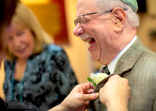 Pinning Boutonniere on FOG_Photo by Michael Temchine.jpg