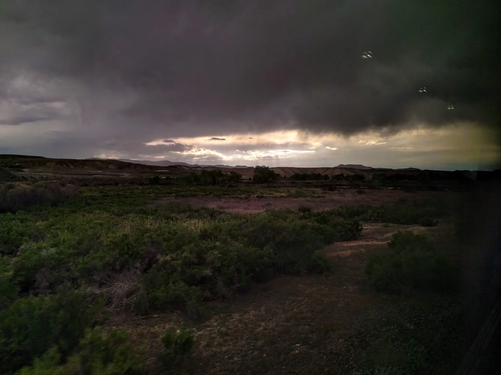  It was as if the clouds were trying so hard not to break into tears till I left — somewhere along the Colorado-Utah border. 