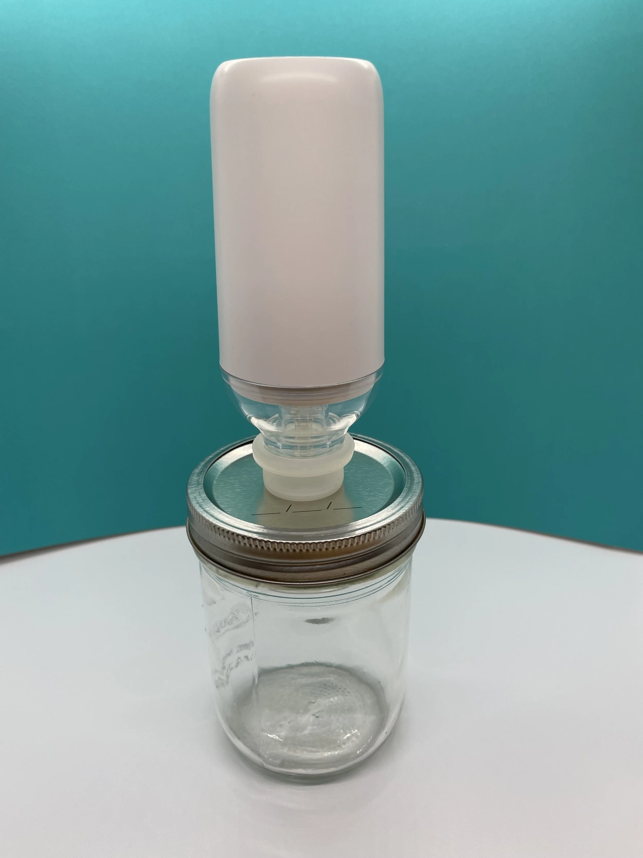 This Sucks Big Time! electric vacuum pump on a mason jar