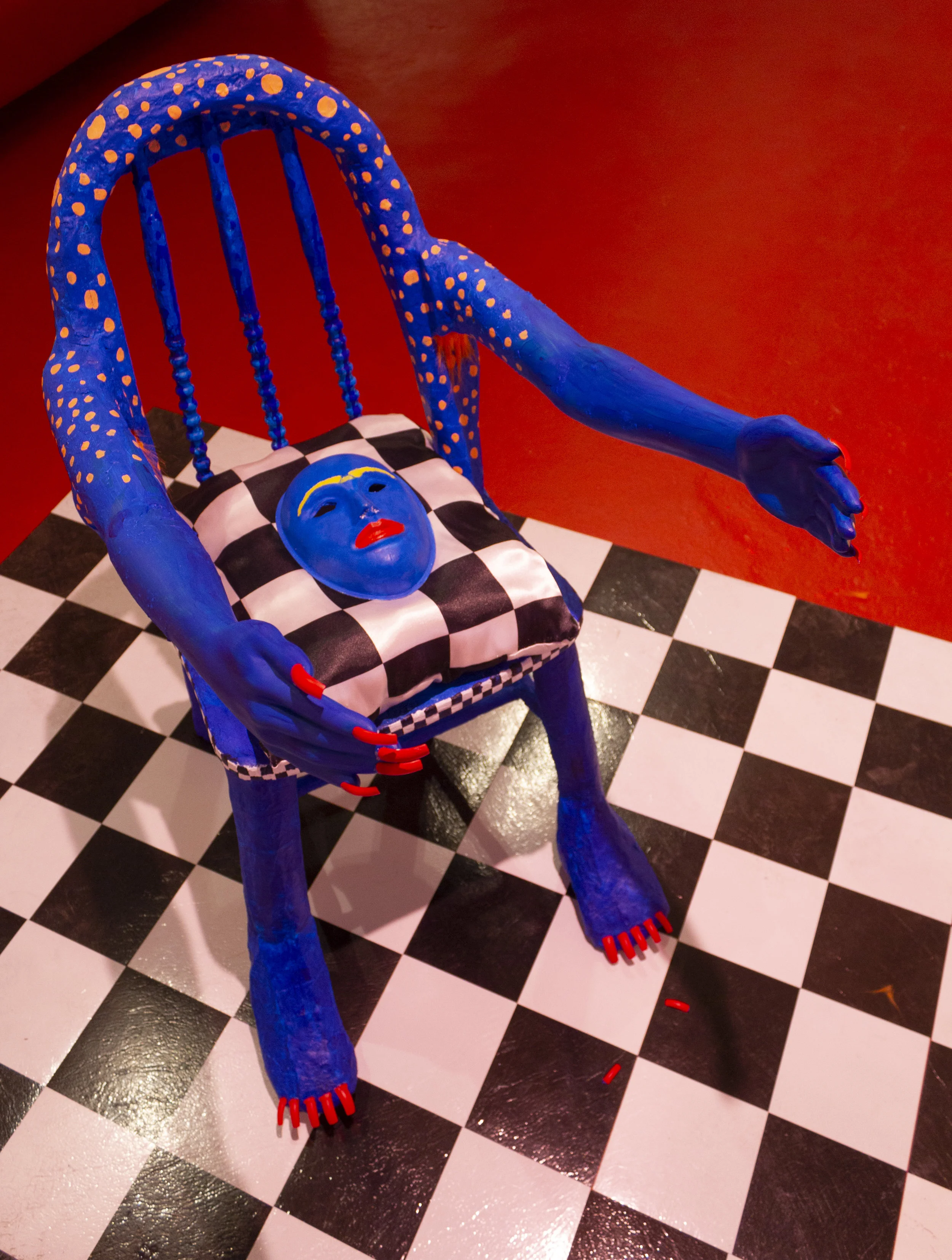 Arm (chair with legs), 2019, wood, insulation foam, fiberglass, FGR-95, acrylic paint, nail polish, dimensions variable Exhibit documentation by Gabrielle Wellensiek part of the 2019 Bachelors of Fine Arts Thesis Exhibition at Cornish College of the Arts